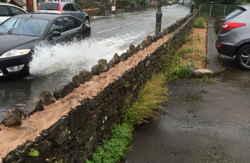 Photo attached of flooding on Windermere Road, Grange over Sands in August 2016